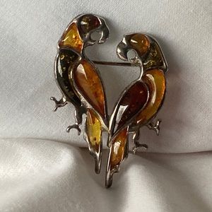 Amber and silver parrot pin